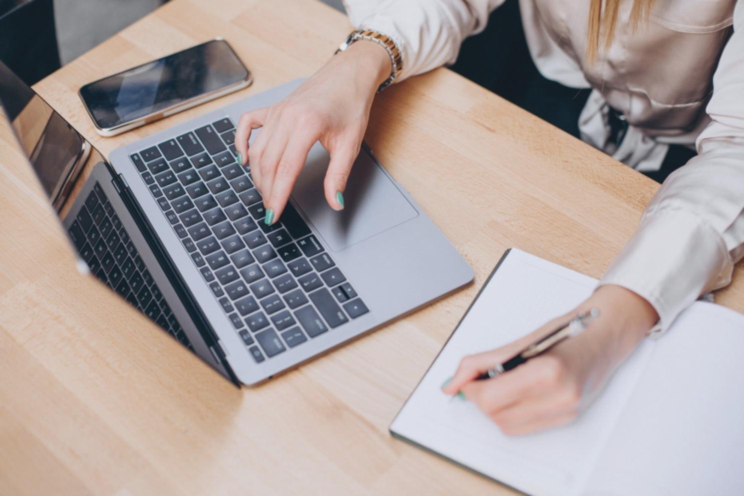 Professional financial planning workspace with budget documents and calculator